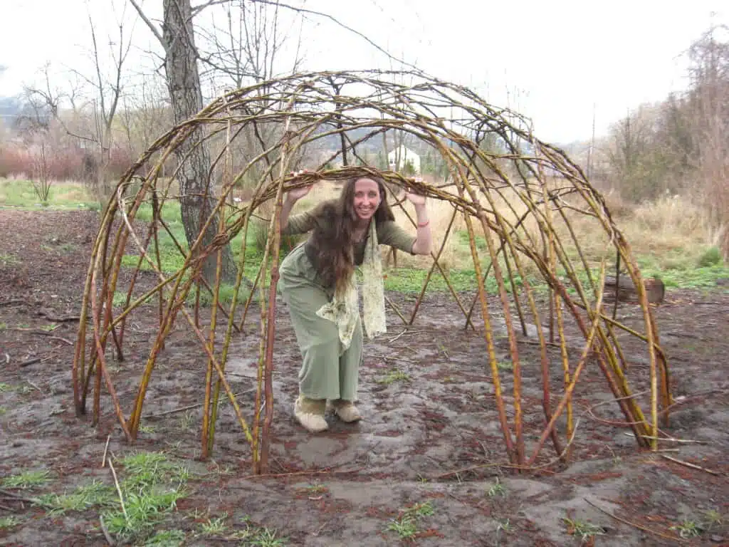Libby inside the newly constructed Living Willow Hut in 2010.