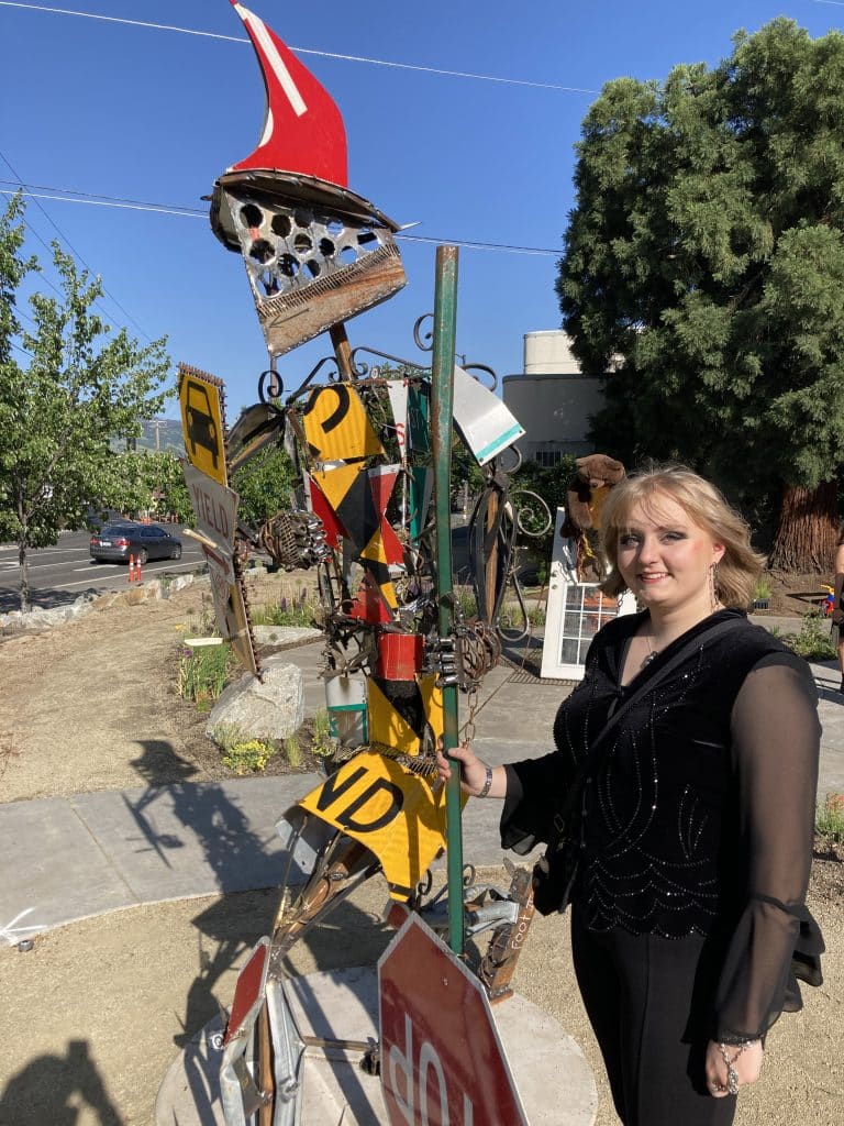 At the opening for Recology Ashland/SOU "artist in residency" program, turning "trash" into art. Photo of artist: Carli Lamberto. Title: ROADKiLL.