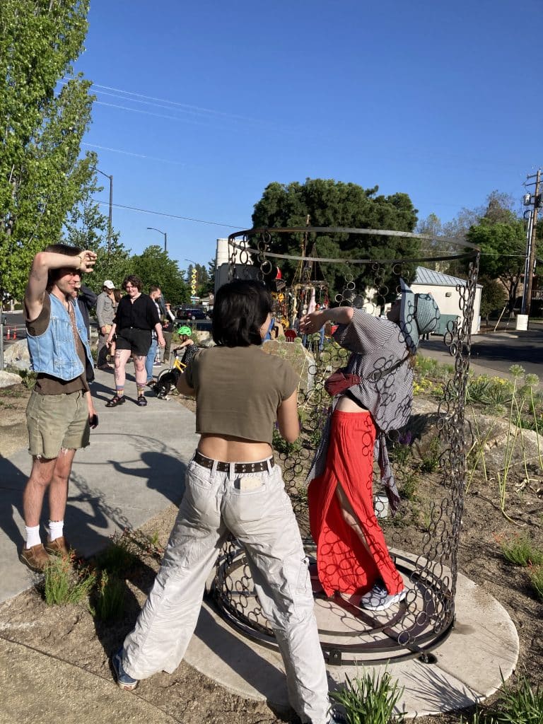 At the opening for Recology Ashland/SOU "artist in residency" program, turning "trash" into art. Artist: Mel Villarreal. Title: Passing Time, Shifting Perspectives.