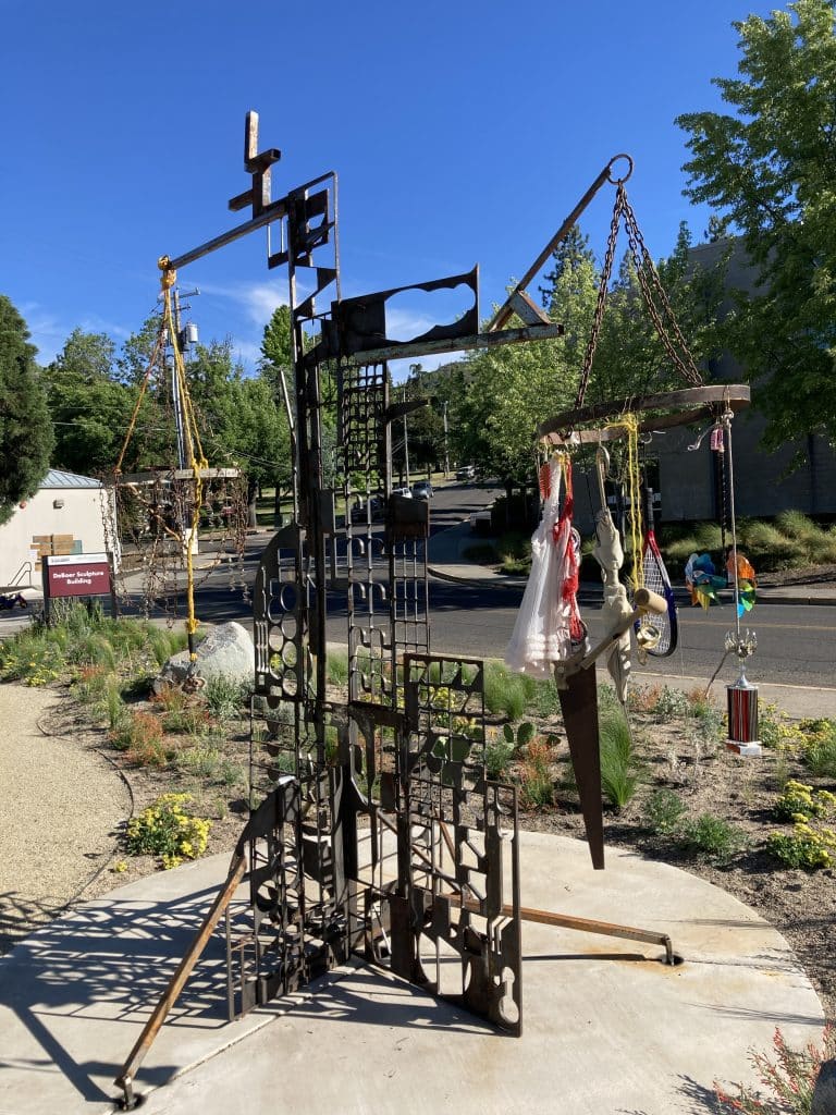 Recology Ashland/SOU "artist in residency" program, turning "trash" into art. Artist: Naia Duggan. Title: "Child, Mother, Crone, Trash."
