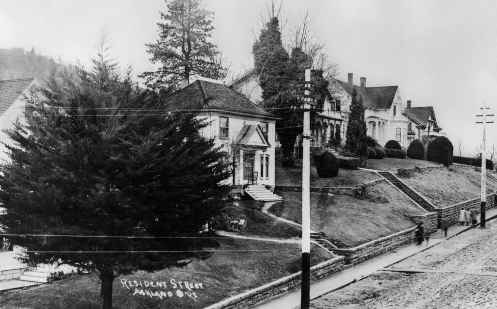 The house Ann Hill Russell built in 1901 at 117 North Main Street is next to the tree in foreground.