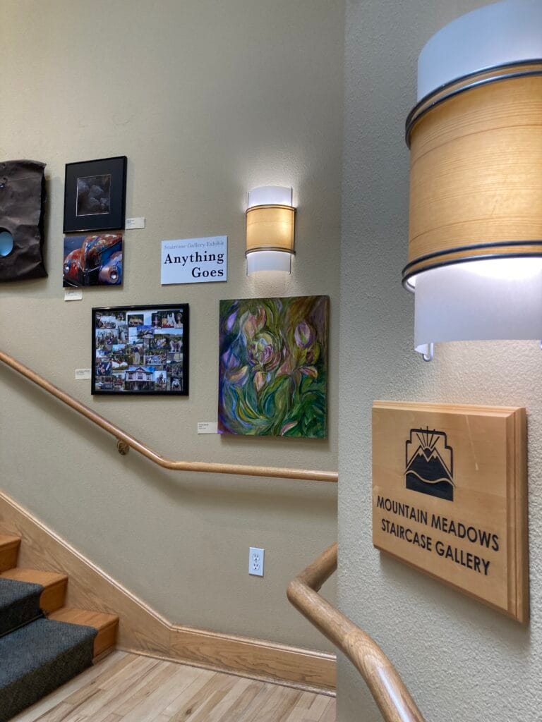 The "Staircase Gallery" in the Clubhouse features art by residents of Mountain Meadows retirement community.