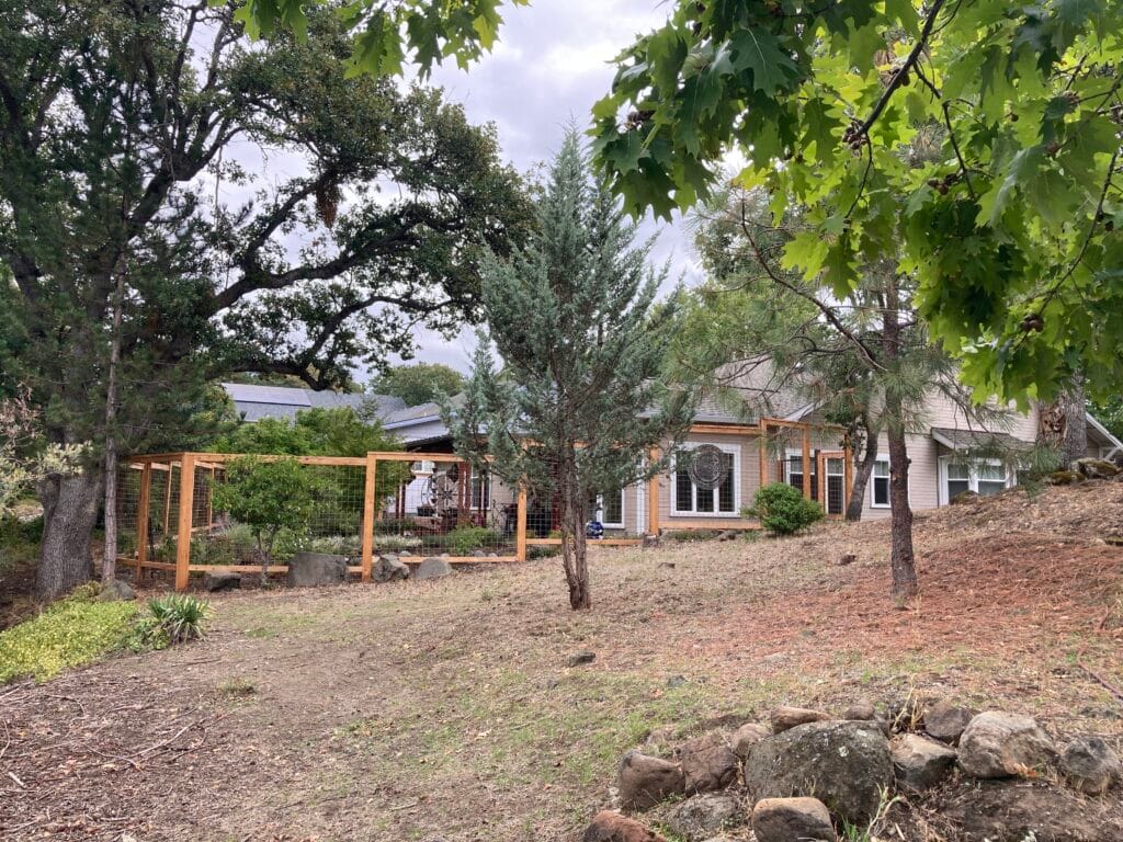 A new "firewise" metal fence in Mountain Meadows.