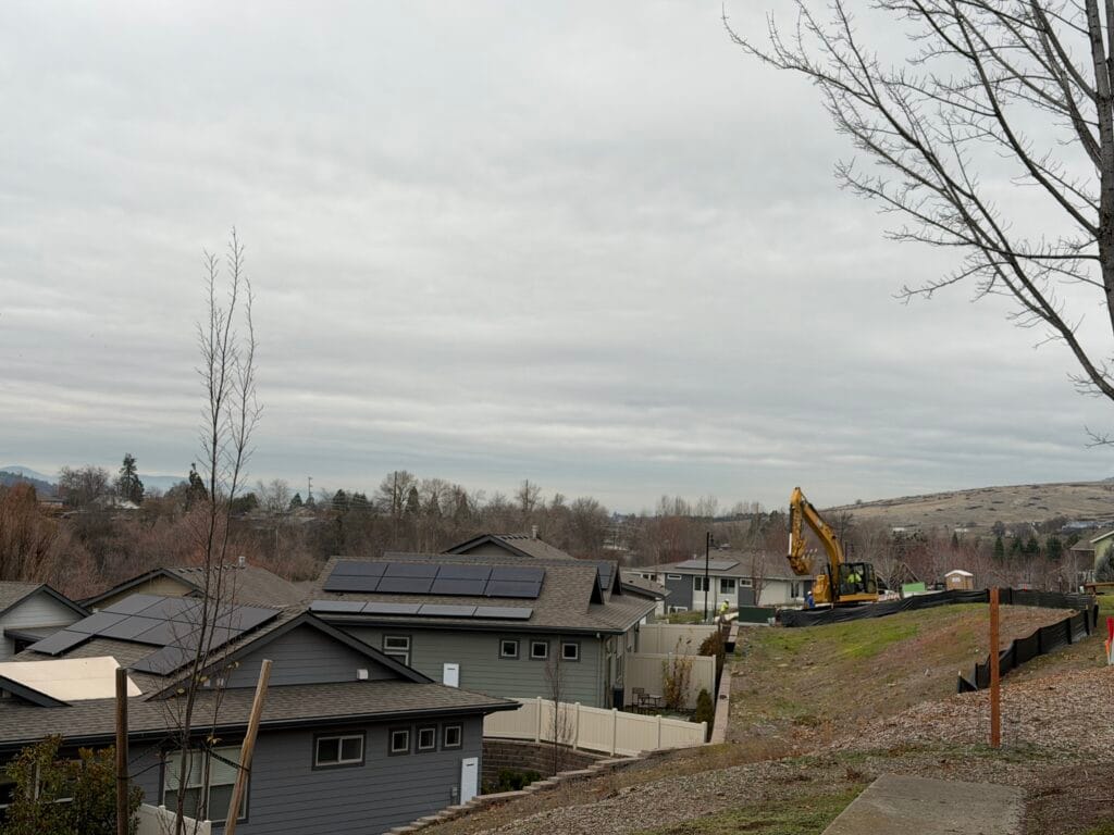 This photo shows Kestrel Park homes downhill from the west end of Mountain Meadows Drive.