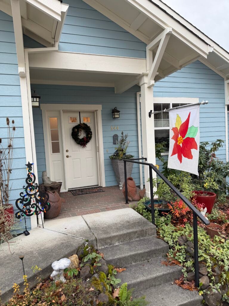 Here is a cheerful front entry on Mountain Meadows Drive.