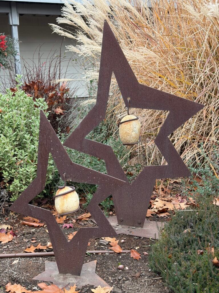 Catchy metal and rock yard art sculptures on Great Oaks Drive.