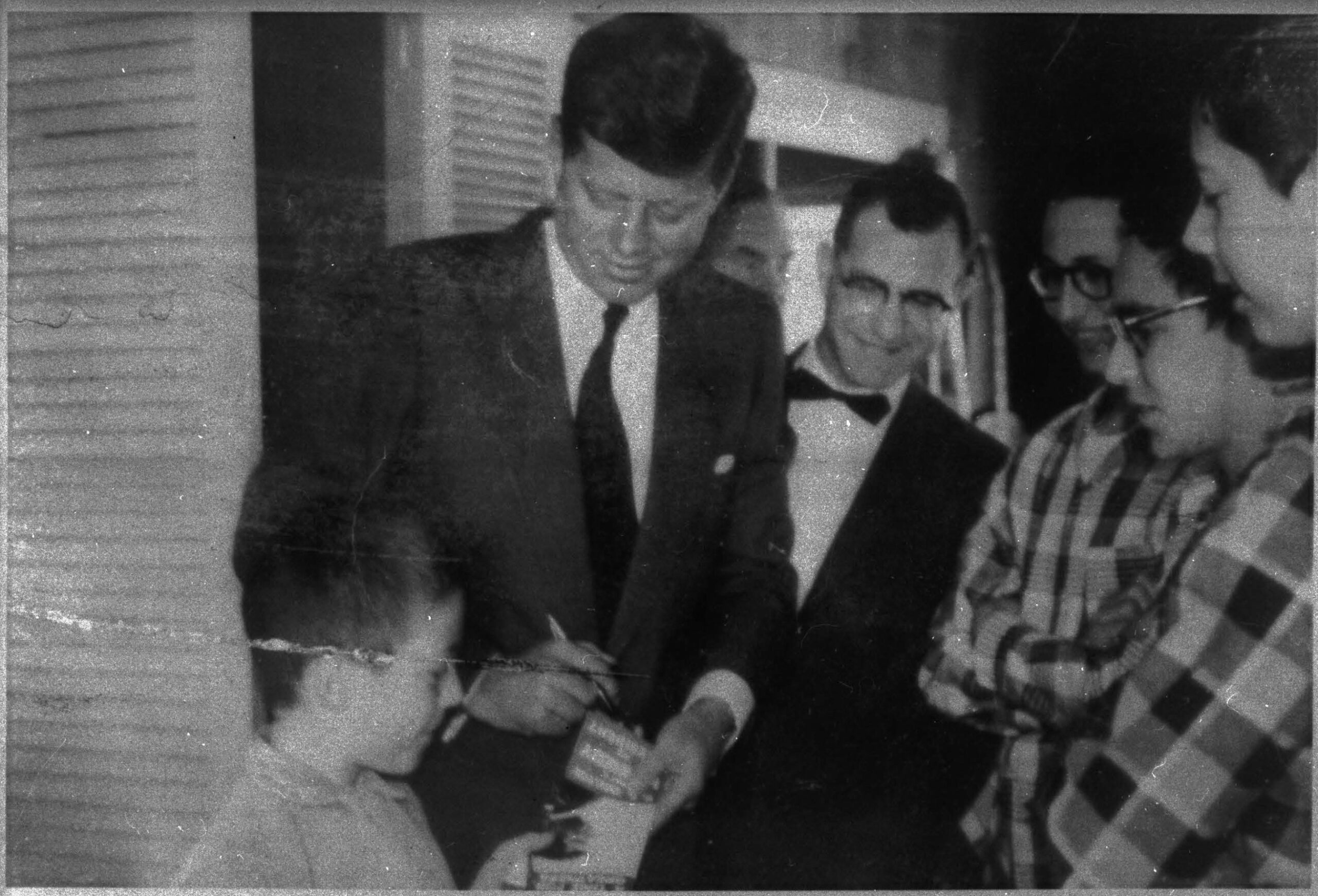 Senator Kennedy at Kreisman's house reception. L to R: James Kreisman, Kennedy, Arthur Kreisman, Steve Kreisman, Richard Kreisman, neighbor/friend Charlie Moore. (SOHS #88919)