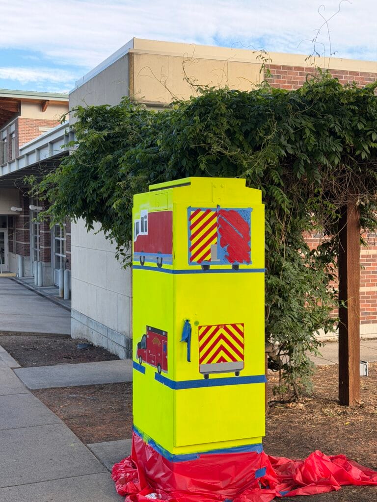 Traffic signal box: "Fire Engine and Ambulance," at the beginning of the second day of painting